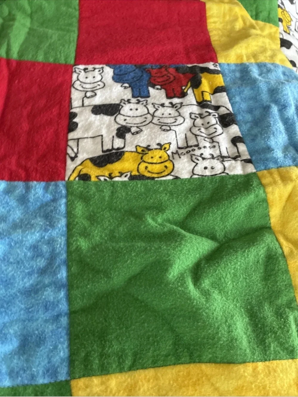 Multi-Color Patchwork Cow Print Baby Quilt - Red, Yellow, Blue, Green